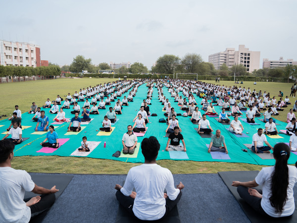 PU Honours the True Essence of “Yoga for Vasudhaiva Kutumbakum” During International Yoga Day, With Local Community Children, and its University Community.